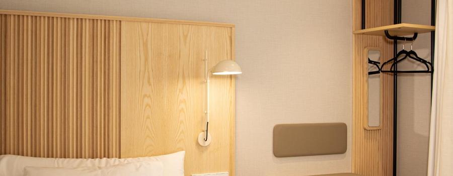 Chambre triple économique (2 lits et 1 canapé-lit) Chambre triple économique (2 lits et 1 canapé-lit)