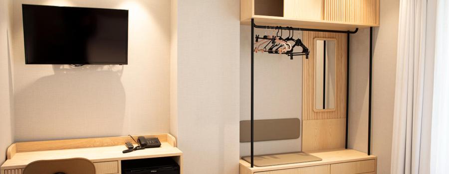 Chambre triple économique (2 lits et 1 canapé-lit) Chambre triple économique (2 lits et 1 canapé-lit)